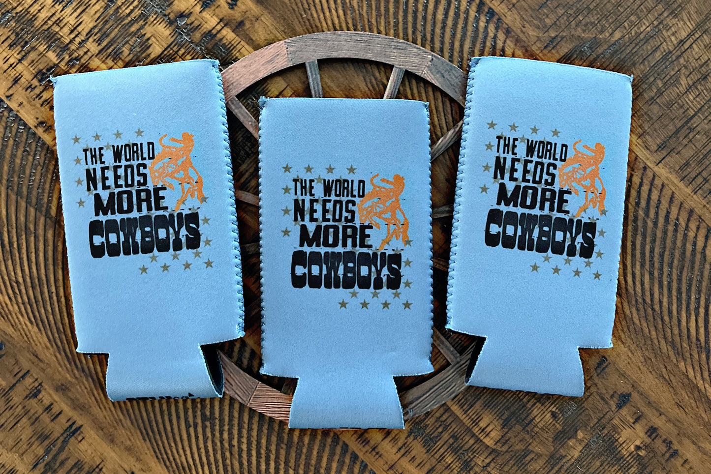 The World Needs More Cowboys Tall Slim Koozie