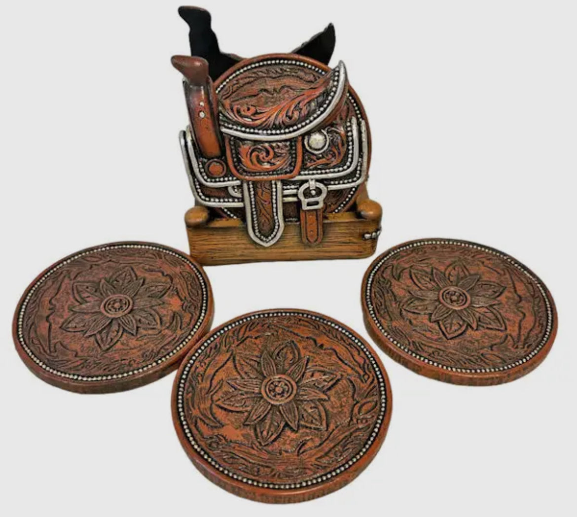 Decorative leather coasters with intricate designs on a white background